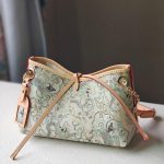 Cloud-Scroll Bow Crossbody